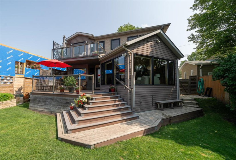 Additional storage space accessible under deck & family room