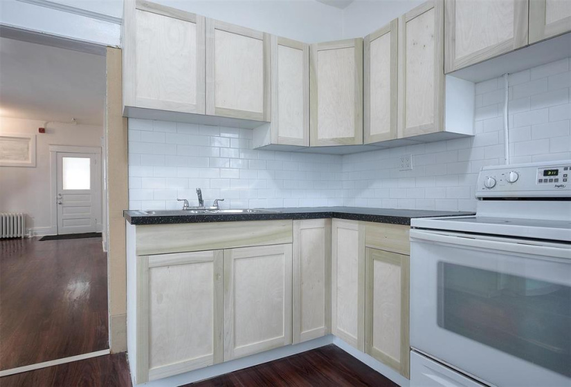 main floor kitchen has even more cabinets than seen here!