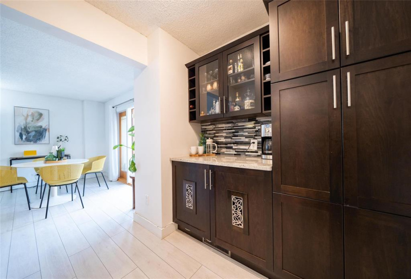 Dry Bar with additional kitchen storage.