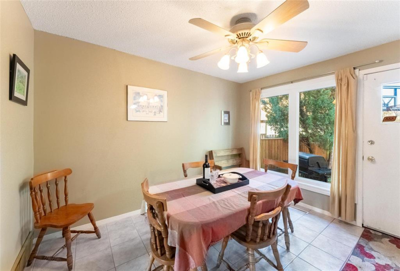 Spacious dining room with door to the back yard