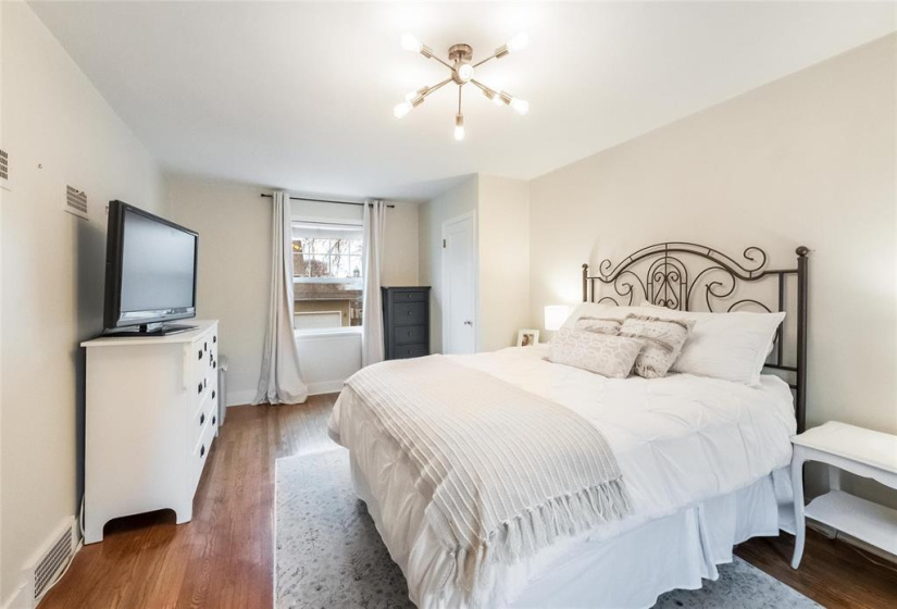 Large primary bedroom with two closets