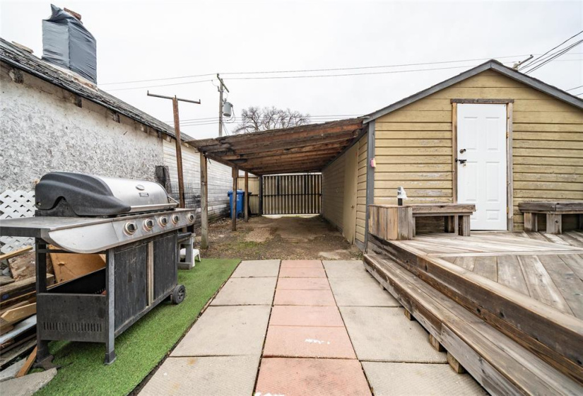 Garage with door opener and carport