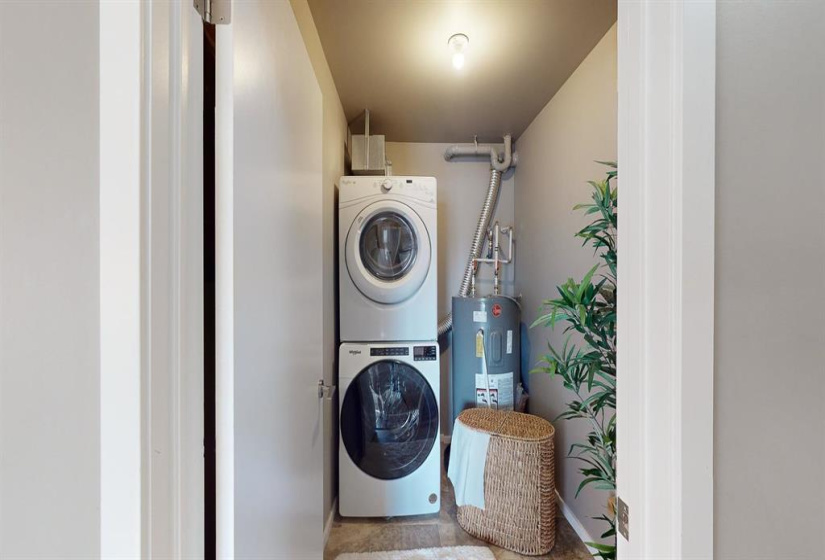 IN SUITE LAUNDRY ROOM WITH FRONT LOADING WASHER AND DRYER! WASHINBG MACHINE WAS REPLACED IN 2023! LOTS OF STORAGE IN THIS ROOM AS WELL!