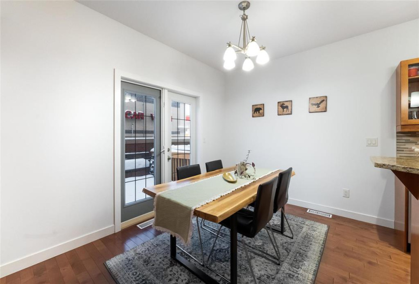 Dining area with garden doors to deck